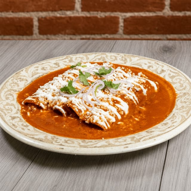 CHICKEN ENCHILADAS (GREEN, RED OR MOLE).